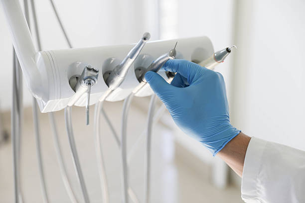 Professional Emergency Dentist technician working in Tawas City, MI